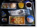 Snídaně cestou do New Yorku u spol. Singapore Airlines (kuře s kokosovou omáčkou a rýže)