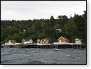 Norské chaty při výletě lodí na fjordy